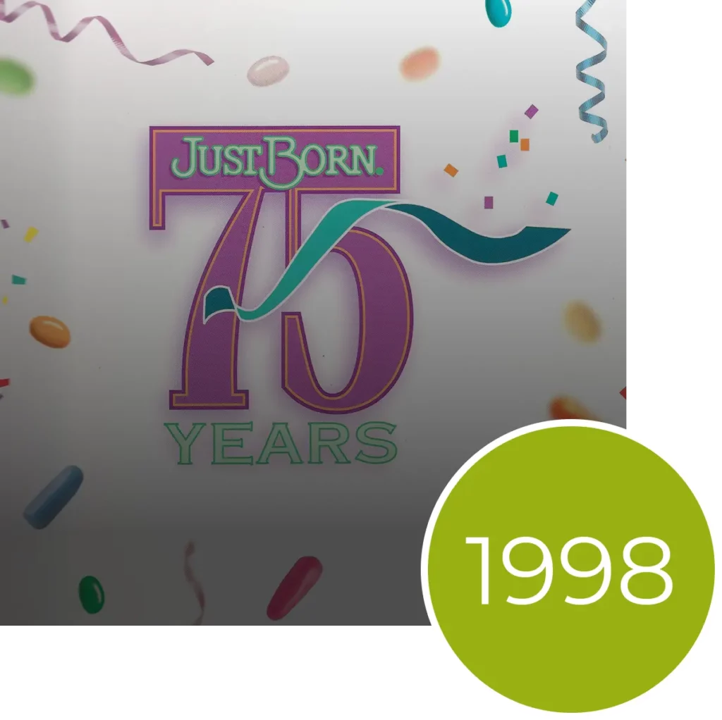 Just Born 75 Years logo with a teal ribbon and confetti, beside a lime green circle with the white text 1998.