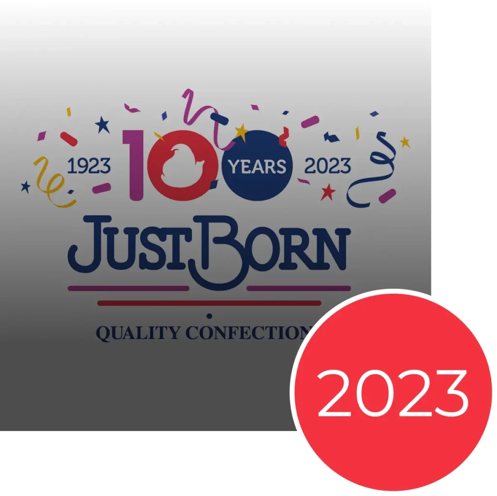 Just Born Quality Confections 100th anniversary logo with confetti, 1923-2023, and a large red 2023 circle.
