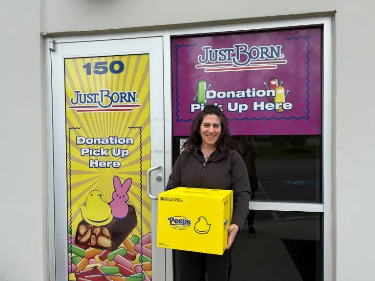 Lady holding peeps box and smiling 