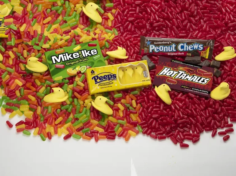 Mike and ike, peeps, peanut chews, hot tamales candies on the floor